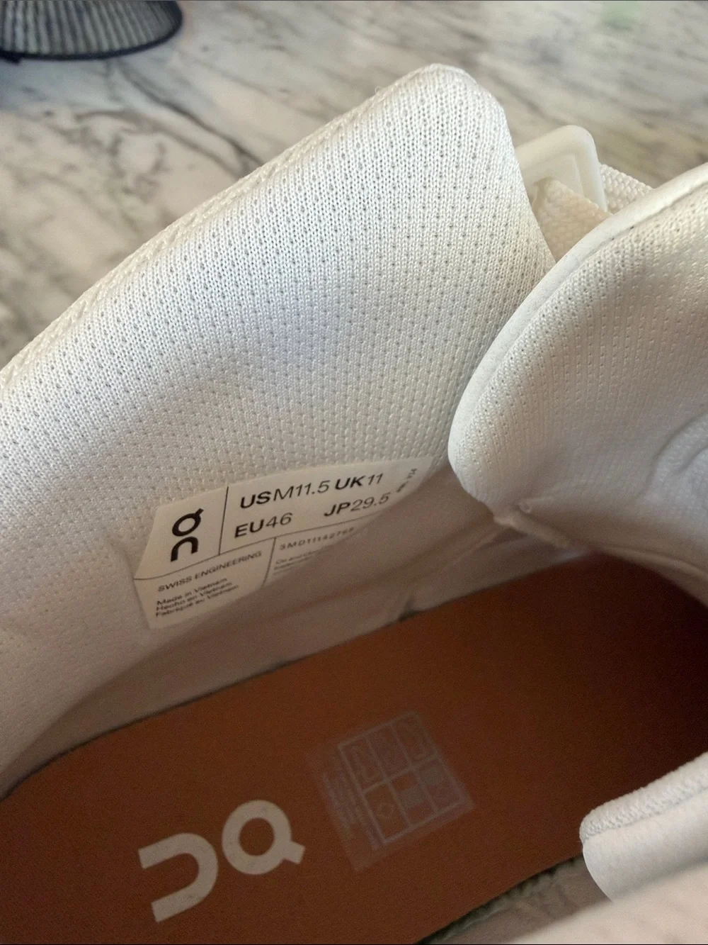 On Running the Roger White Sneakers with Tan Accents - Picture 5 of 11
